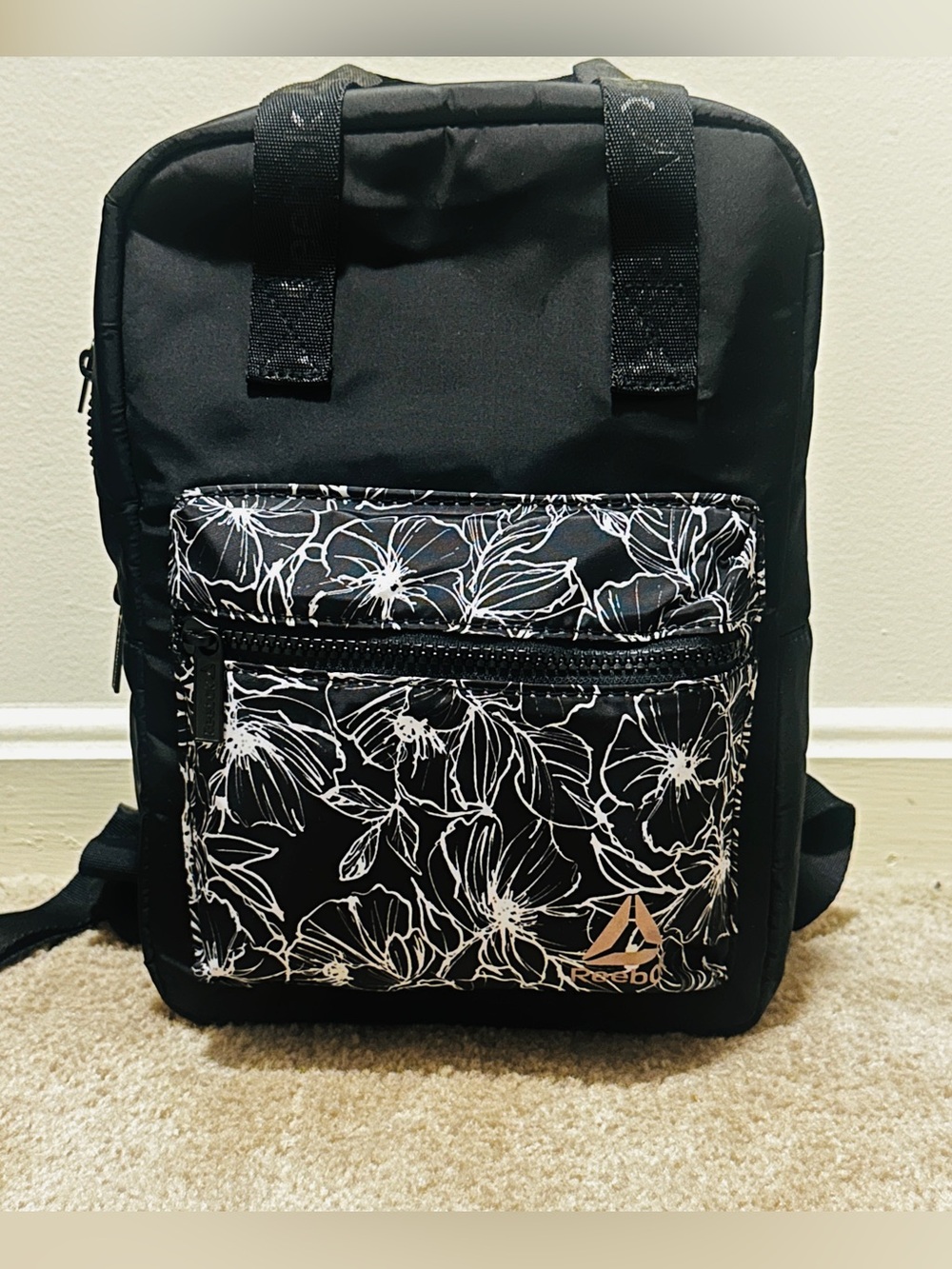 Reebok Black Backpack with White Floral Front Pocket